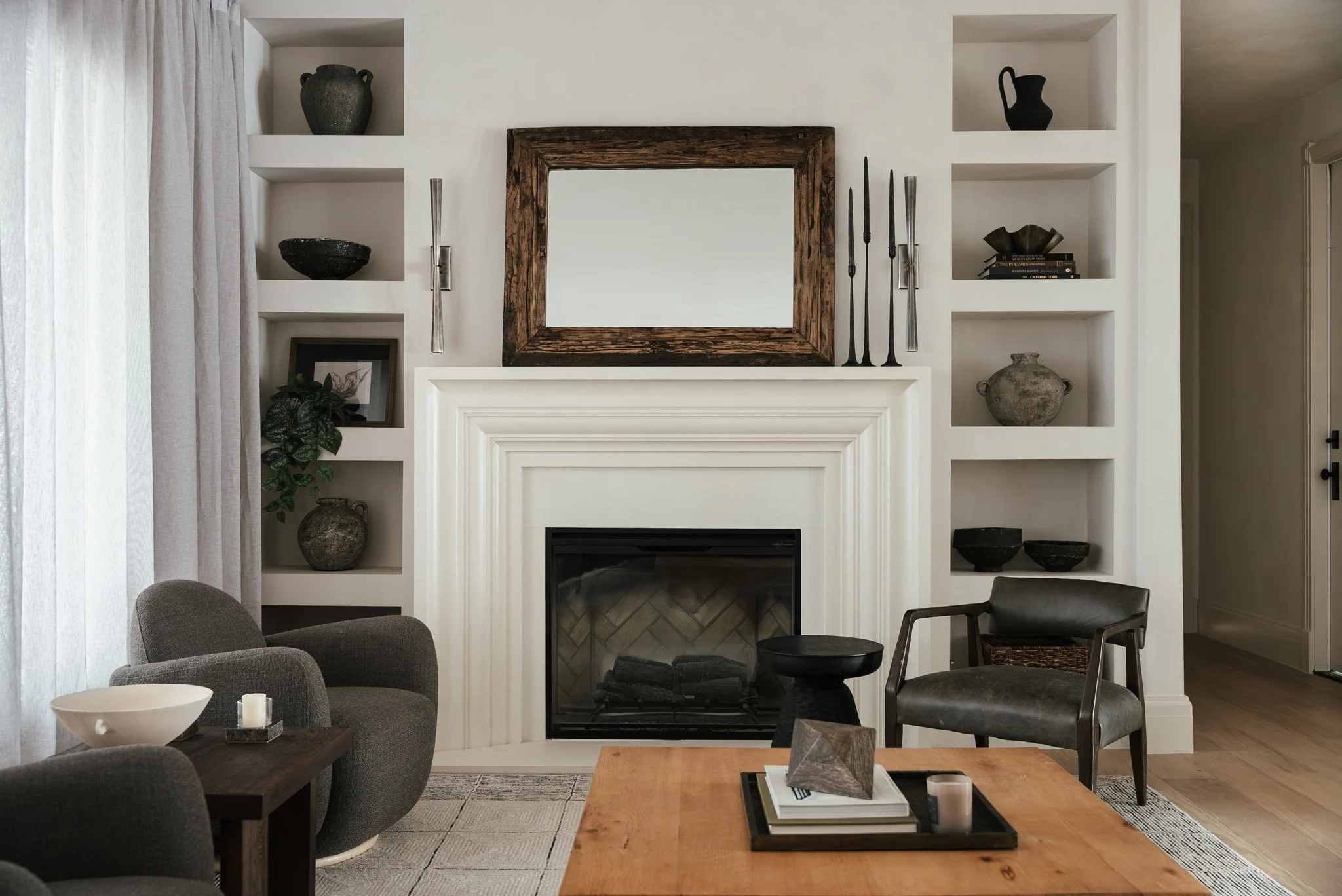 Fireplace wall and integrated display shelves